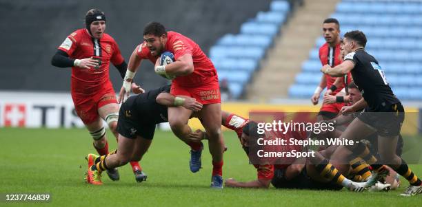 Toulouse's Emmanuel Meafou is tackled by Wasps's Rodrigo Martinez during the Heineken Champions Cup match between Wasps and Stade Toulousain at The...