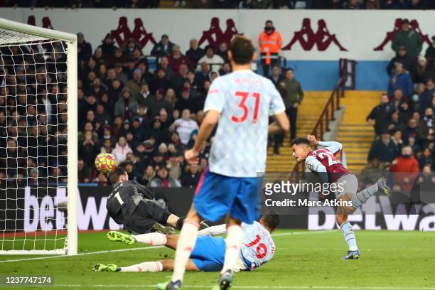 Philippe Coutinho of Aston Villa scores their 2nd goal during the Premier League match between Aston Villa and Manchester United at Villa Park on...