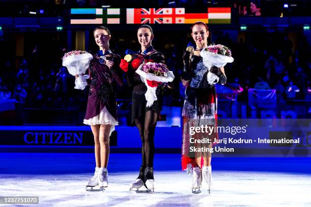 Gold medal winner Kamila Valieva of Russia, silver medal winner Anna Scherbakova of Russia and bronze medal winner Alexandra Trusova of Russia pose...