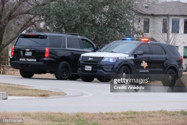 Police take security measures after a gunman holding hostages at Beth Israel Congregation Synagogue in Colleyville, Texas, United States on January...