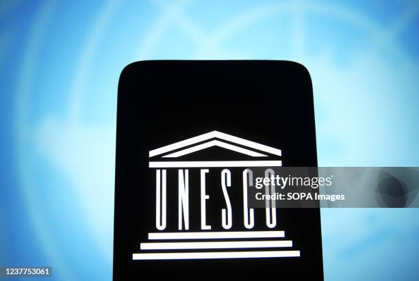 In this photo illustration, UNESCO logo is seen on a smartphone screen.