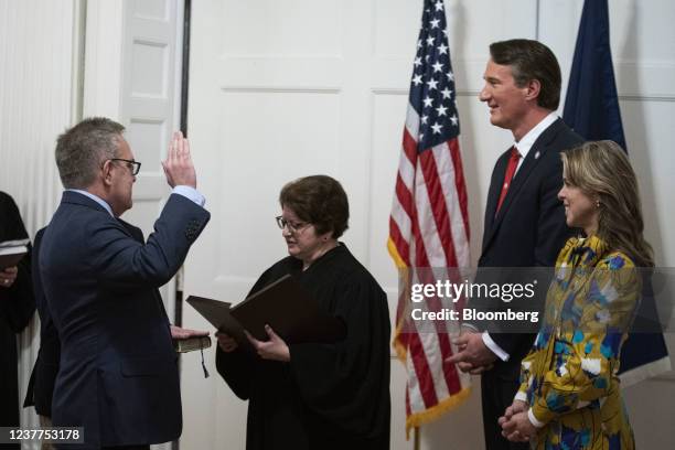 Andrew Wheeler, Virginia's incoming secretary of natural resources, left, as Glenn Youngkin, governor of Virginia, and Suzanne Youngkin, first lady...