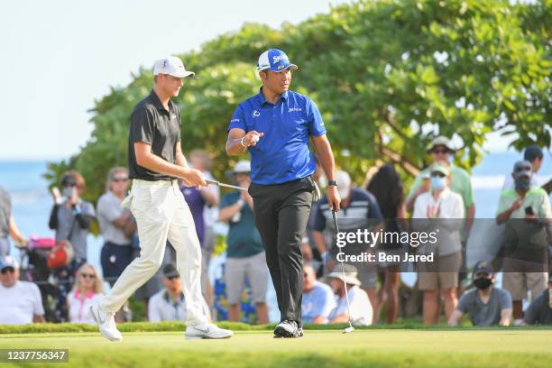 Hideki Matsuyama of Japan waves his ball on the 17th green during the third round of the Sony Open in Hawaii at Waialae Country Club on January 15,...