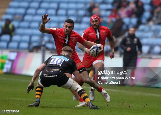 Toulouse's Matthis Lebel avoids the challenge of Wasps' Charlie Atkinson during the Heineken Champions Cup match between Wasps and Stade Toulousain...