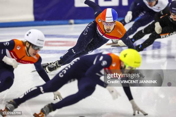 Netherlands' Jens Van't Wout , Dylan Hoogerwerf and Itzhak De Laat compete in the Men's final of the 500 meters short-track speed skating at the...