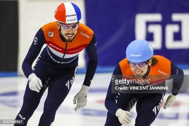 Netherlands' Dylan Hoogerwerf and Jasper Brunsmann compete in the Men's C final of the 1000 meters short-track speed skating at the Invitation Cup in...