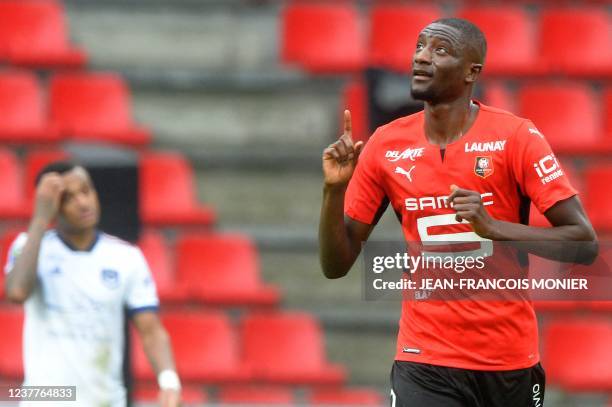 Rennes' French forward Serhou Guirassy reacts after scoring during the French L1 football match between Stade Rennais FC and Bordeaux at The Roazhon...