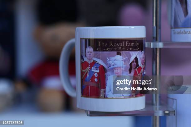 Souvenir mug featuring an image of Prince Andrew alongside Queen Elizabeth II is displayed in a shop window on January 16, 2022 in London, England....