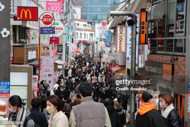 Local and foreign tourists walk about at Takeshita Street, where ornaments representing the "Harajuku" fashion defined by the word "kawaaii" are...