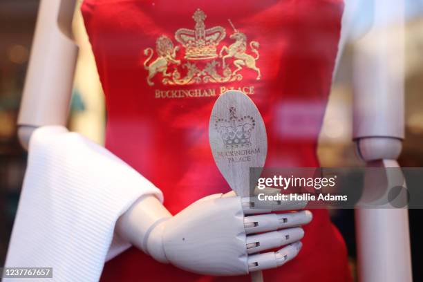 Buckingham Palace souvenir wooden spoon is displayed in a shop on January 16, 2022 in London, England. On Thursday, Buckingham Palace announced...