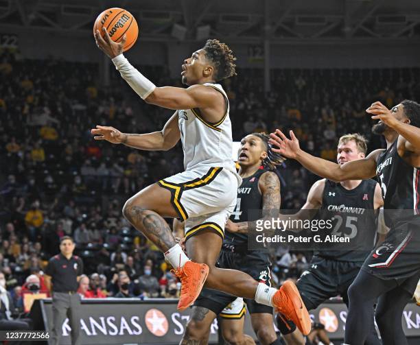 Tyson Etienne of the Wichita State Shockers drives to the basket against the Cincinnati Bearcats during the first half at Charles Koch Arena on...