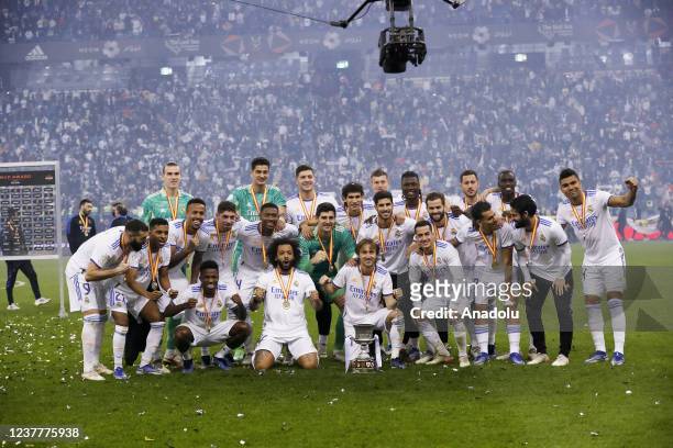 Players of Real Madrid celebrate after winning the Spanish Super Cup final football match against Athletic Bilbao on January 16, 2022 at the King...