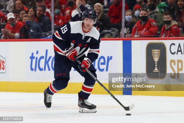 Washington Capitals center Nicklas Backstrom controls the puck during a game against the Vancouver Canucks at Capital One Arena on January 16, 2022...