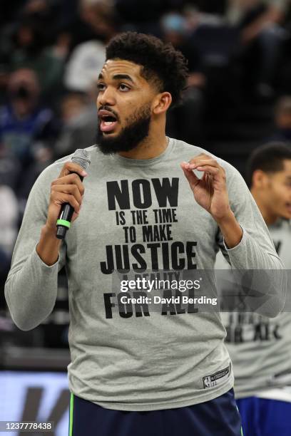 Karl-Anthony Towns of the Minnesota Timberwolves addresses the crowd while wearing a shirt honoring Dr. Martin Luther King, Jr. Before the start of...