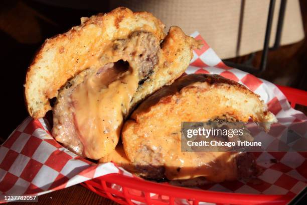 The Juicy Lucy at Lucy&apos;s in the Humboldt Park neighborhood of Chicago, which is their take on the cheese-stuffed burger that two Minneapolis...