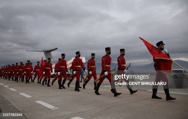 Albanian honor guards arrives for a welcoming ceremony for Turkish President at Tirana's Mother Teresa International Airport on January 17, 2022. -...