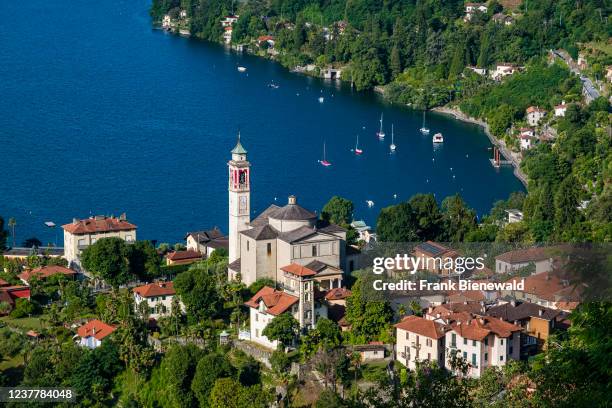 Aerial view on the roofs of Cannero, the church Chiesa Parrocchiale di San Giorgio and Lake Maggiore.