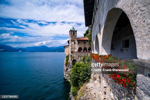 The Hermitage of Santa Caterina del Sasso, a Roman Catholic monastery, located on a rocky ridge at Lake Maggiore.