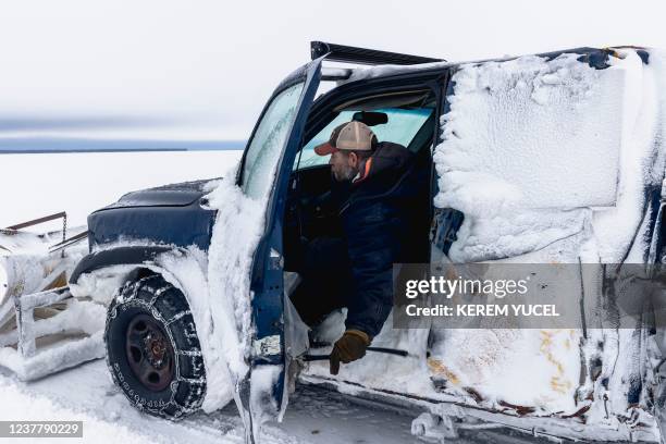 Snowplow driver at the Northwest Angle ice rink in Lake of the Woods between Warroad and Angle Inlet, Minnesota, January 17, 2022. - The Northwest...