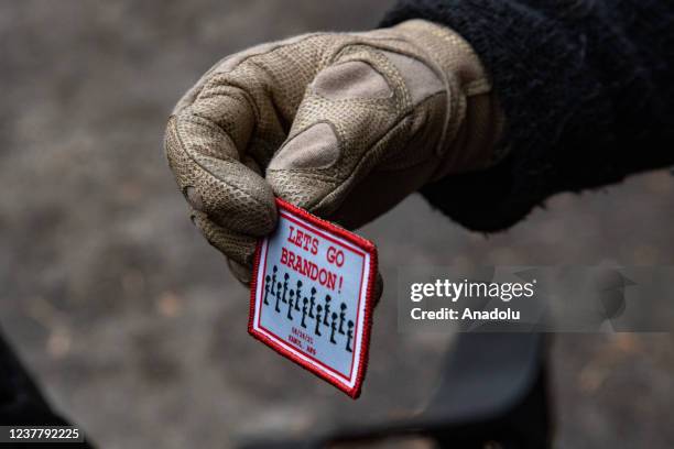 Demonstrator shows a custom patch during a gun rights rally outside of the Virginia State Capitol in Richmond, Virginia on January 17, 2022