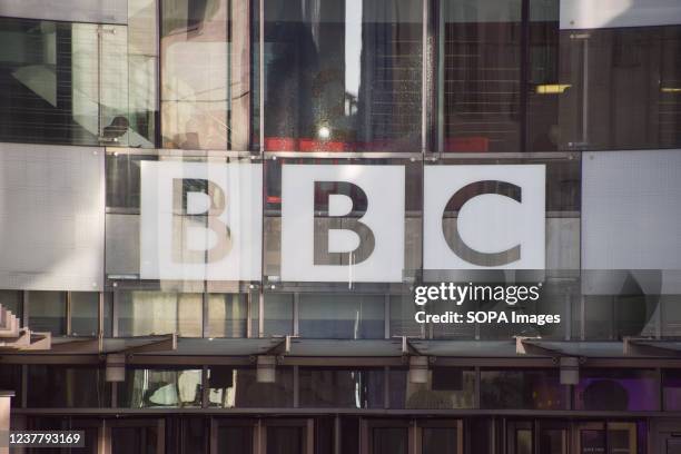 The BBC logo is seen at the entrance at Broadcasting House, the BBC headquarters in central London. The UK government has announced it will freeze...