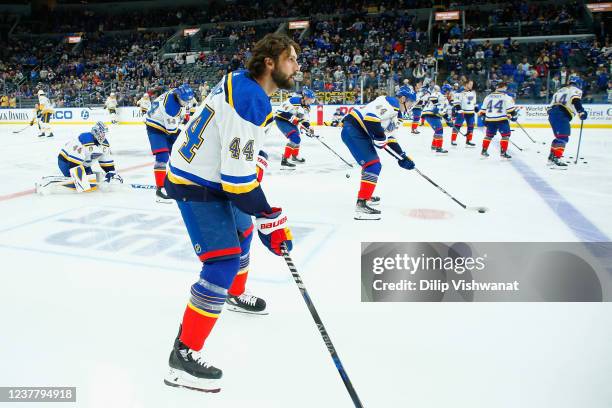 Robert Bortuzzo of the St. Louis Blues and teammates wear number 44 jerseys to honor former Blues player Chris Pronger, whose jersey was retired...