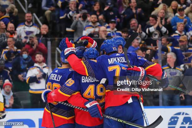 Members of the St. Louis Blues celebrate after scoring a goal against the Nashville Predators during the first period at Enterprise Center on January...