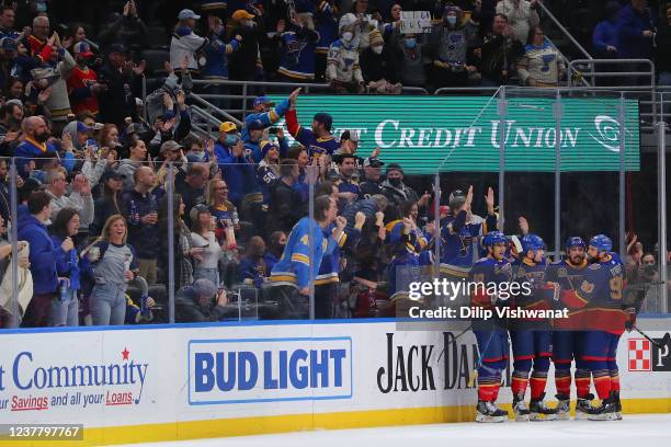 Members of the St. Louis Blues celebrate after scoring a goal against the Nashville Predators during the second period at Enterprise Center on...