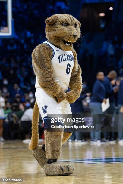 Villanova mascot Will D. Cat flexes on the court during the mens college basketball game between the Butler Bulldogs and Villanova Wildcats on...