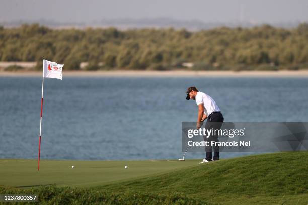 Joost Luiten of the Netherlands putts on the 16th green during a practice round prior to the Abu Dhabi HSBC Championship at Yas Links Golf Course on...