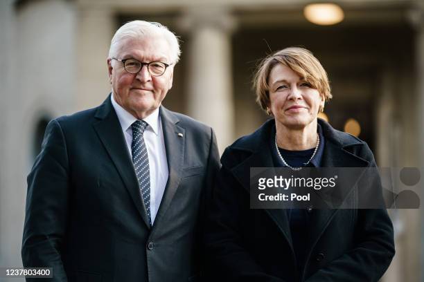 German President Frank-Walter Steinmeier and his wife Elke Buedenbender pose for media during a visit to the Wannsee Conference memorial on January...