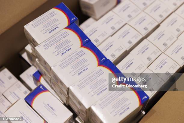 Boxes of Pfizer Inc.s Paxlovid antiviral medication in a warehouse in Shoham, Israel, on Jan. 18, 2022. A fourth dose of the Pfizer-BioNTech vaccine...