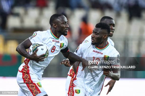 Guinea's midfielder Naby Keita celebrates after scoring his team's first goal during the Group B Africa Cup of Nations 2021 football match between...