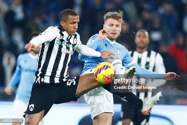 Rodrigo Becao of Udinese Calcio and Ciro Immobile of SS Lazio battle for the ball during the Coppa Italia match between Juventus and UC Sampdoria at...
