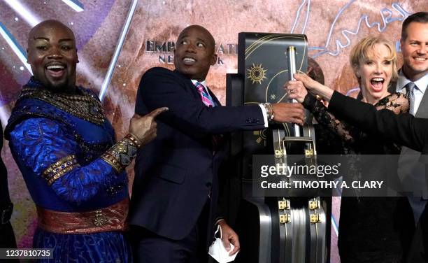 Actor Michael James Scott who plays the role of the Genie in Disneys Aladdin, New York City Mayor Eric Adams and actress Charlotte dAmboise , who...