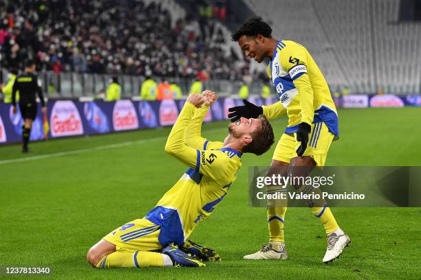 Daniele Rugani of Juventus FC celebrates a goal with team mate Juan Cuadrado during the Coppa Italia match between Juventus and UC Sampdoria at...