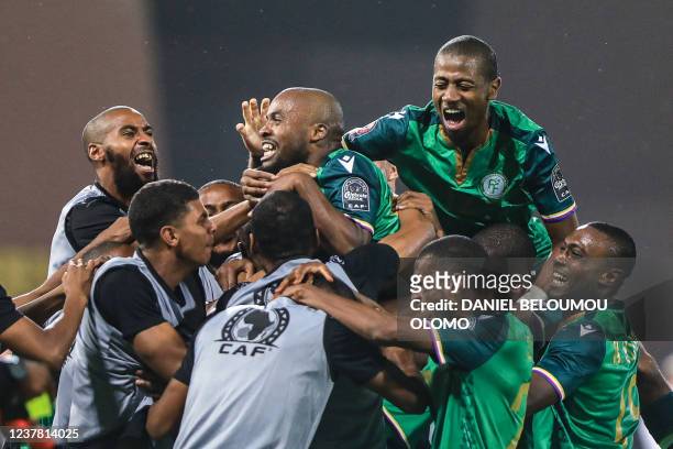 Comoros' forward Ahmed Mogni celebrates with teammates after scoring his team's second goal during the Group C Africa Cup of Nations 2021 football...