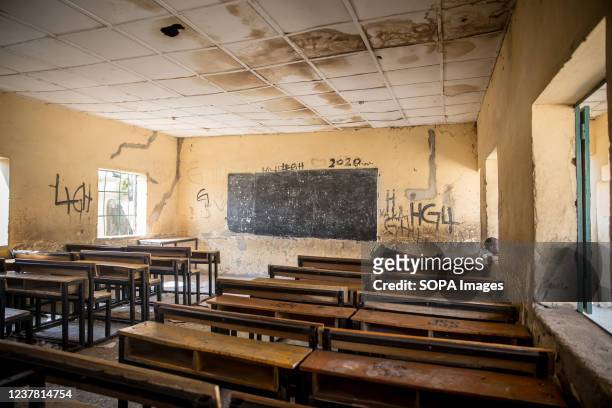 Boy seen laying on a desk in an empty classroom of Moduganari primary school. Northeast Nigeria has been experiencing an insurgency since 2009, which...