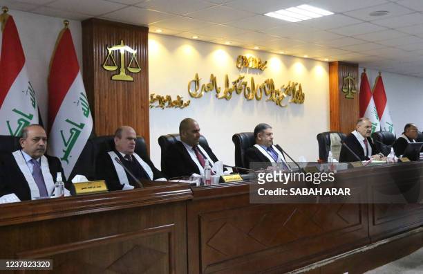 Iraqi judges attend a court session at the Supreme Judicial Council in the Iraqi capital Baghdad on January 19, 2022. - Iraq's top court on January...