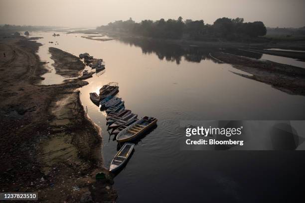 Boats moored to the bank of the Ravi River in Lahore, Pakistan, on Monday, Dec. 13, 2021. The government wants to spend $7 billion to develop the...
