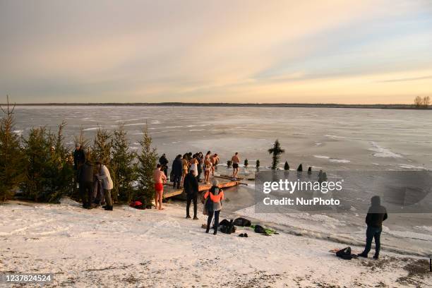 An Orthodox believers bathes in the icy water on Epiphany in Kyiv sea in Vyshgorod near Kyiv, Ukraine. January 19, 2022