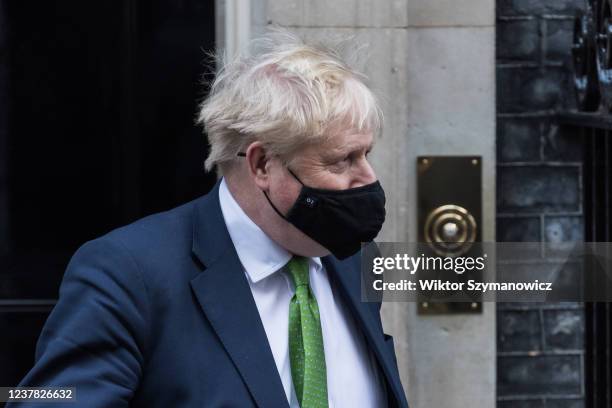 British Prime Minister Boris Johnson leaves 10 Downing Street for PMQs at the House of Commons on January 19, 2022 in London, England. Folowing the...