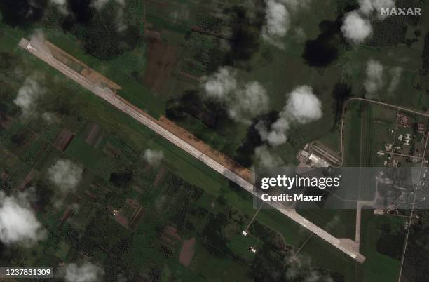 Maxar overview satellite imagery shows the ash covered runway at Fua Amotu Airport on January 18 after the Hunga Tonga-Hunga Ha'apai volcano eruption...