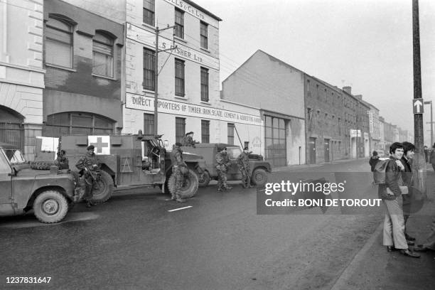 English army soldiers are stationed near the civil rights march organized to challenge the Northern Ireland government's ban on protests held on...