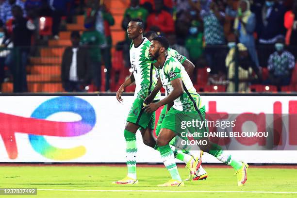 Nigeria's forward Umar Sadiq celebrates after scoring his team's first goal during the Group D Africa Cup of Nations 2021 football match between...
