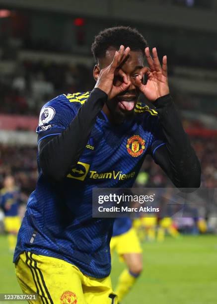 Anthony Elanga celebrates scoring the opening goal during the Premier League match between Brentford and Manchester United at Brentford Community...