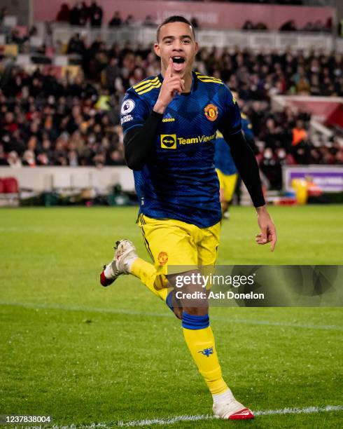 Mason Greenwood of Manchester United celebrates scoring a goal to make the score 0-2 during the Premier League match between Brentford and Manchester...