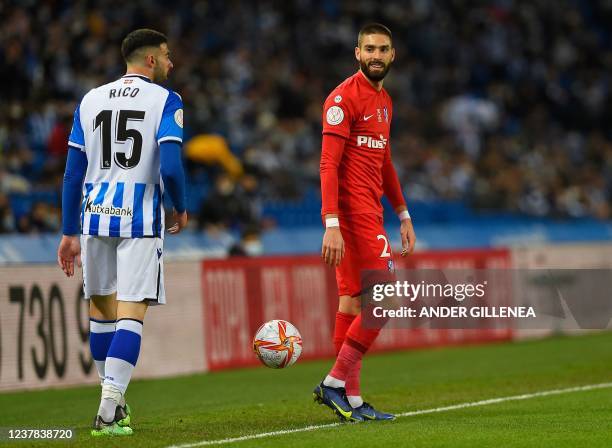 Atletico Madrid's Belgian midfielder Yannick Carrasco reacts during the Copa del Rey round of 16 first leg football match between Real Sociedad and...