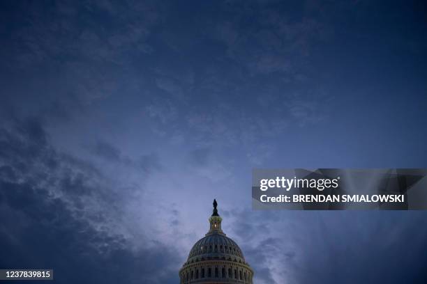 View of Capitol Hill as the Senate is expected to consider the legislation tonight January 19 in Washington, DC. - The US Senate was set to vote...