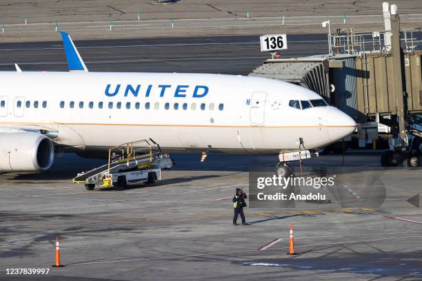 Passenger airplane is seen at the Newark Liberty International Airport in Newark, New Jersey, United States on January 19, 2022. Major airlines have...